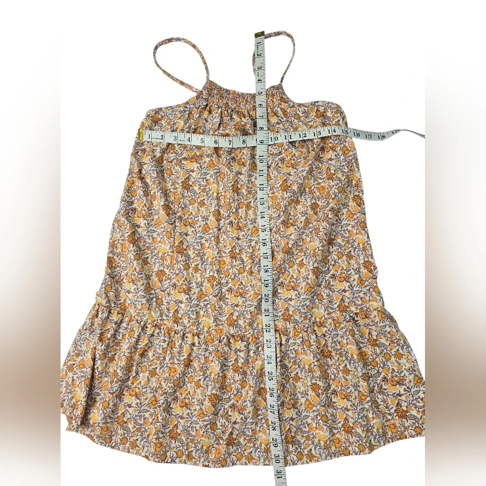 Old Navy girls' sleeveless summer sundress in orange, yellow, and white